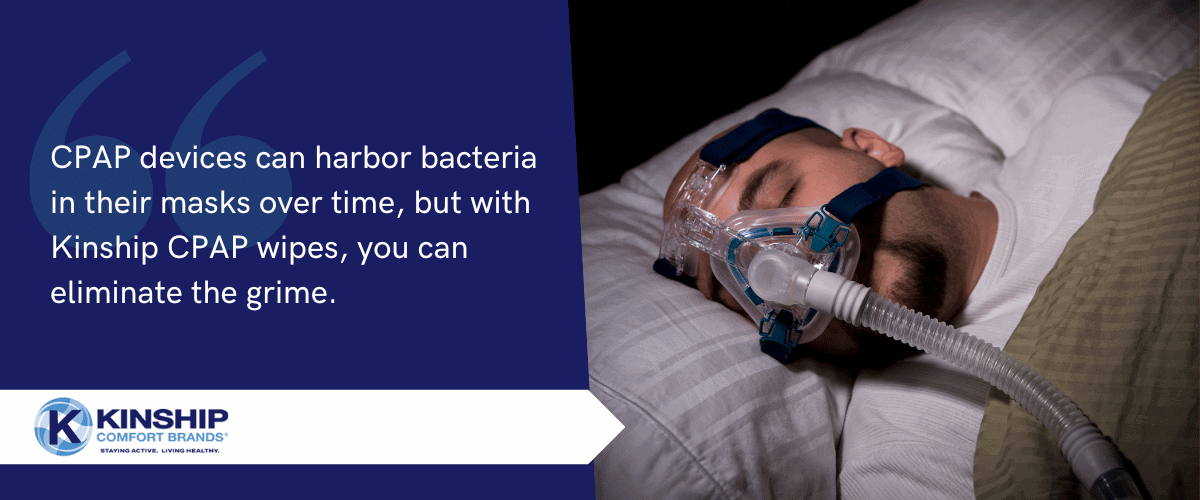 A man wearing a CPAP mask while sleeping, and a quote about Kinship CPAP mask wipes can eliminate grime next to him.